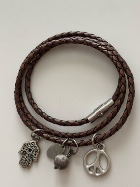 Triple Wrapped Leather Bracelet with Charms Magnetic closure.